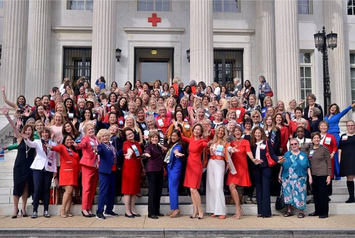Tiffany Circle members gathered together for a group photo in front of the Red Cross headquarters building in DC