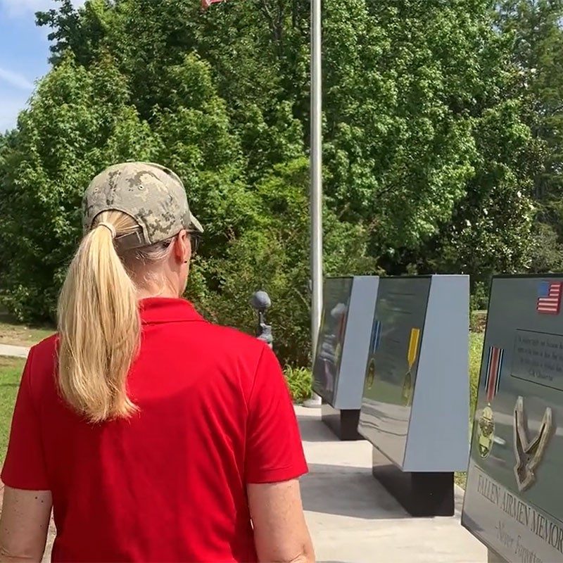 Sarah Masters looking at Fallen Airmen Memorial