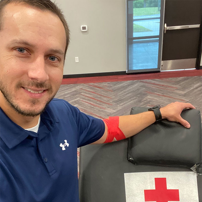 Brandon Lackey takes selfie after donating blood