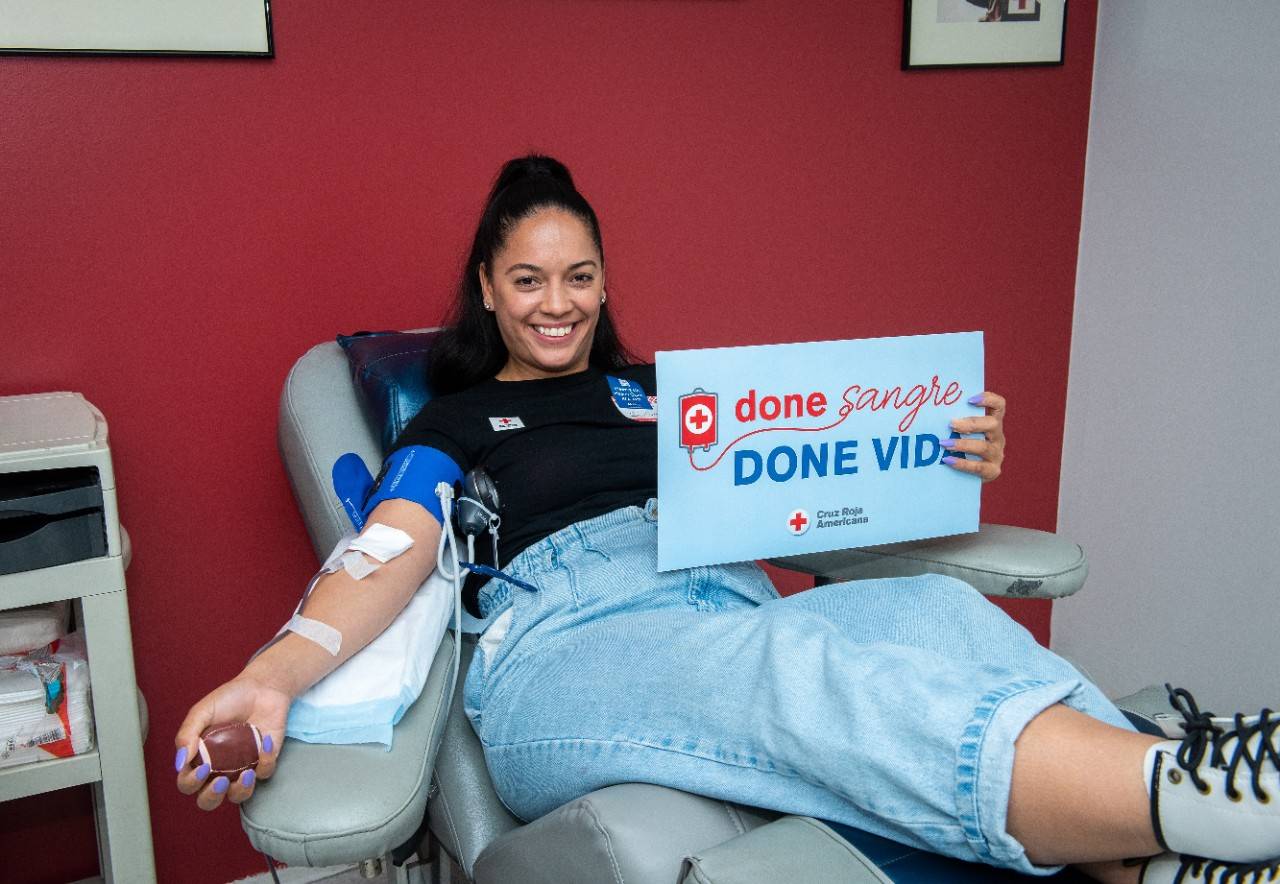 Sonimar Torres giving blood at a rec cross donation center
