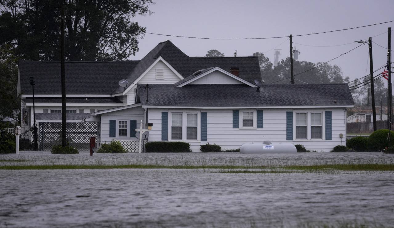 September 15, 2018. Faison, North Carolina.

Homes are surrounded and inundated with rain and flood waters during Hurricane Florence after rivers, streams and swamps overflow along the Cape Fear River Basin more than 70 miles up-river from the ocean outlets. 
Photo by Daniel Cima/American Red Cross