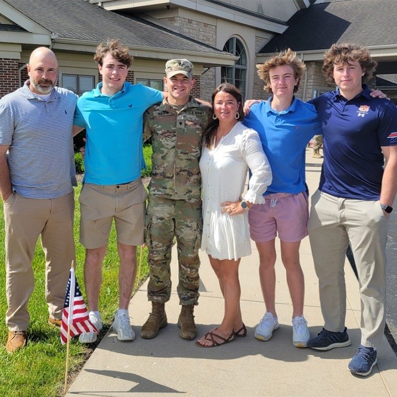 Group photo with military member and family.
