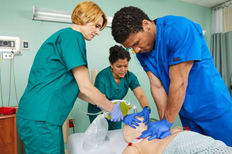 Hospital staffers run a practice resuscitation code.