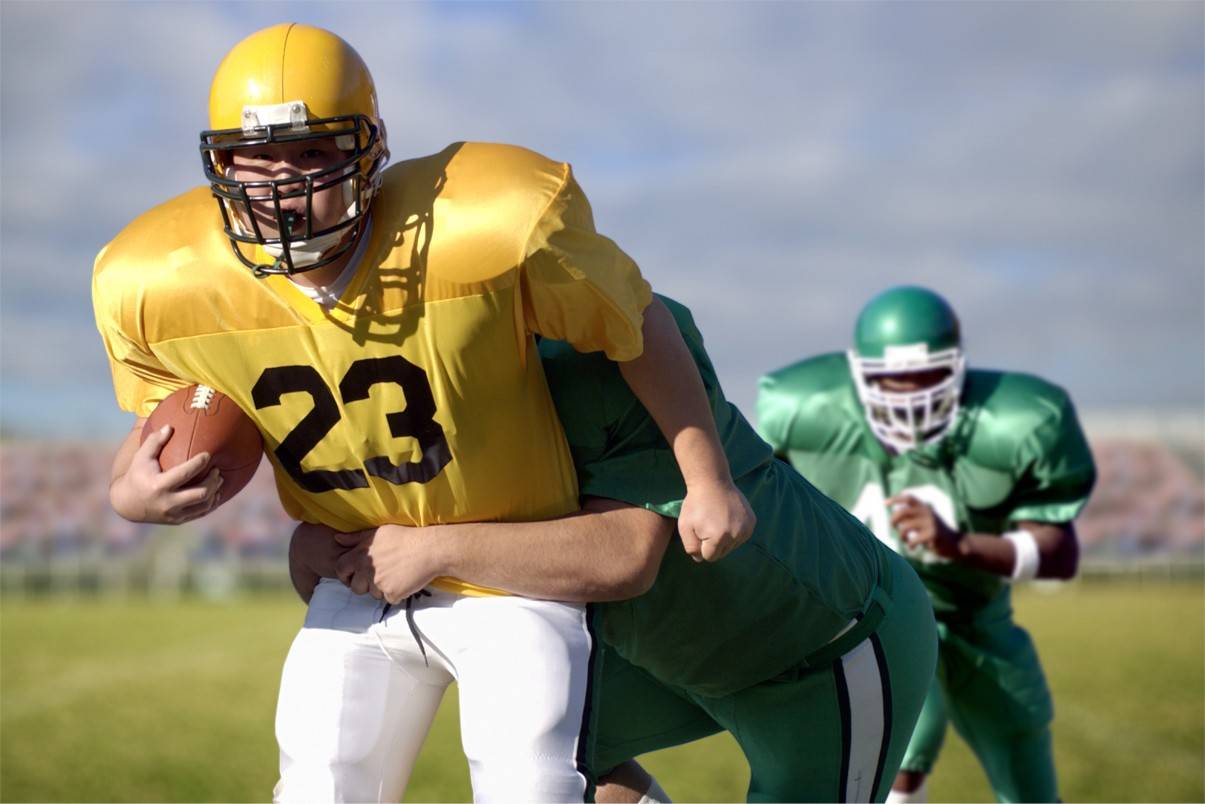 Student Athletes playing football