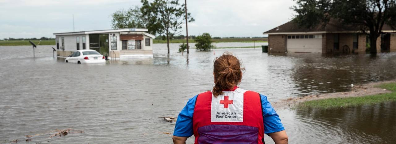 July 28, 2020. Edcouch, Texas
Juanita Casanova of the American Red Cross surveys flooding caused by Hurricane Hanna, on the outskirts of Edcouch, TX on Tuesday July 28, 2020.
Photo by Scott Dalton/American Red Cross