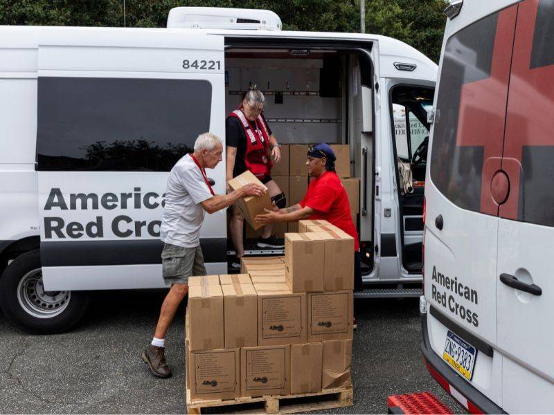 volunteers loading vehicle