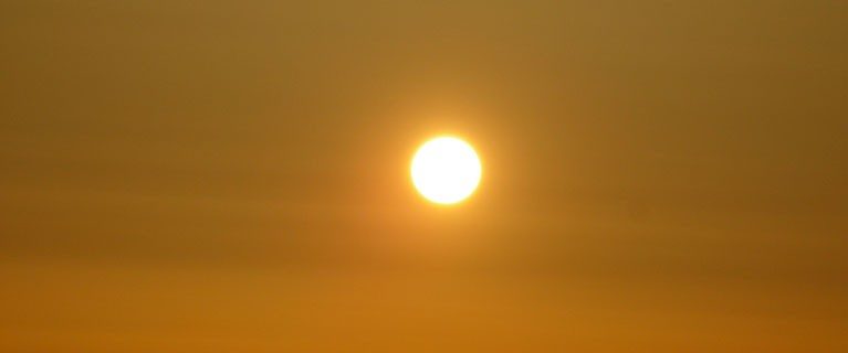 Image of scorching sun in the sky