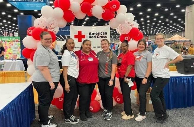 group of red cross staff and volunteers at a blood drive