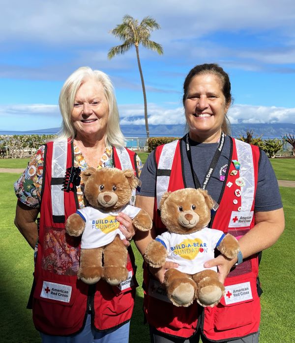 A supply of Build-A-Bear toys were sent the Maui after a wildfire destroyed homes. Red Cross volunteers Cathy Gordon, left, and Jaki Breininger were in Hawaii and saw how the bears comforted children recovering from the disaster. (Red Cross photo)