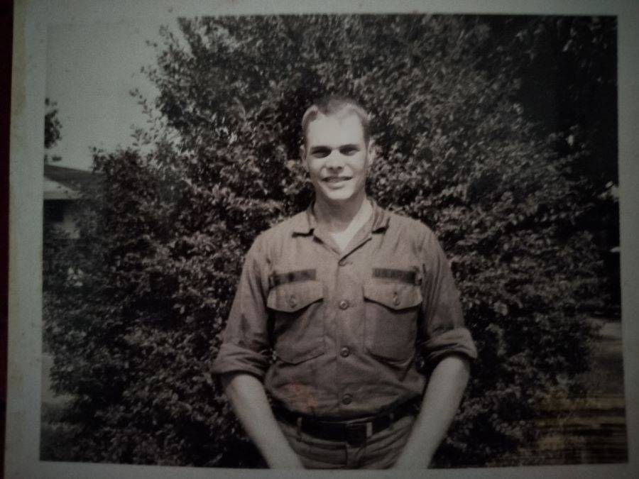 Ficklin in Army shirt with tree behind him 