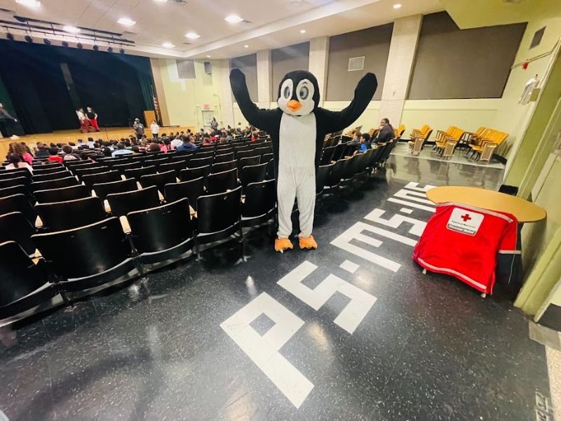 pedro the penguin mascot in auditorium