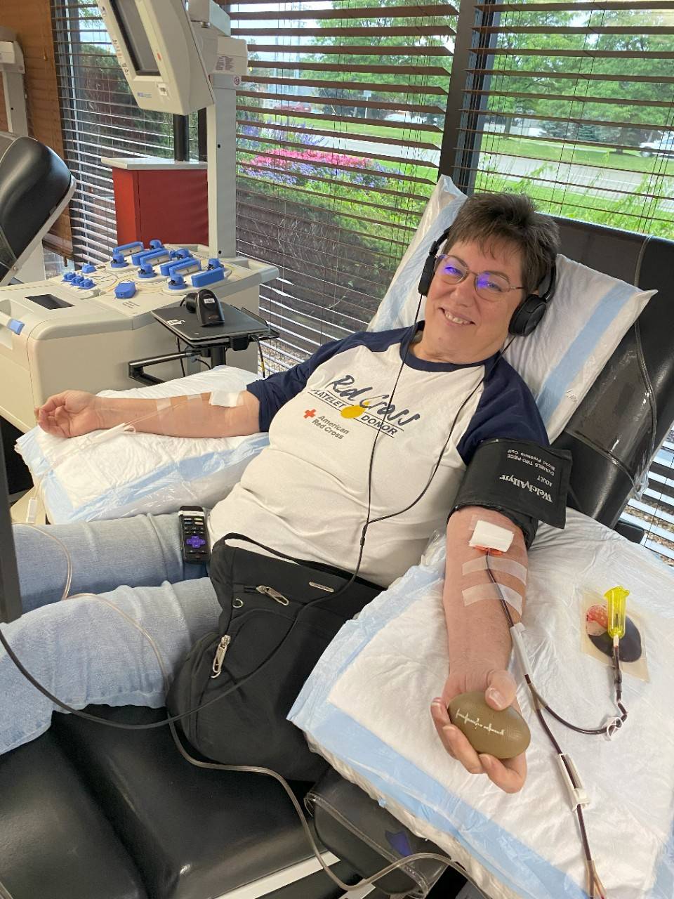 Donor donating platelets at Red Cross facility