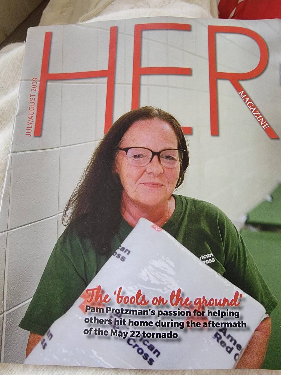 pam protzman on the cover of HER magazine