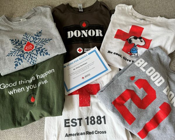 phillip's collection of blodd donor shirts