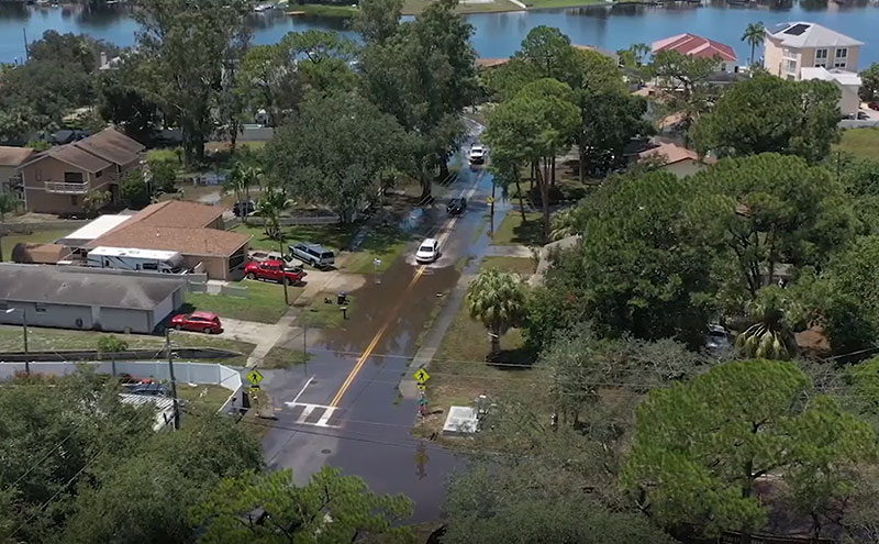 Ariel view of flooded residential street.
