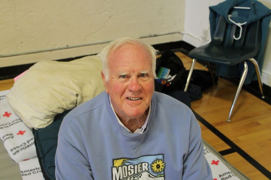 Marc Berry sat on his bed in the Hood River Middle School Red Cross shelter.