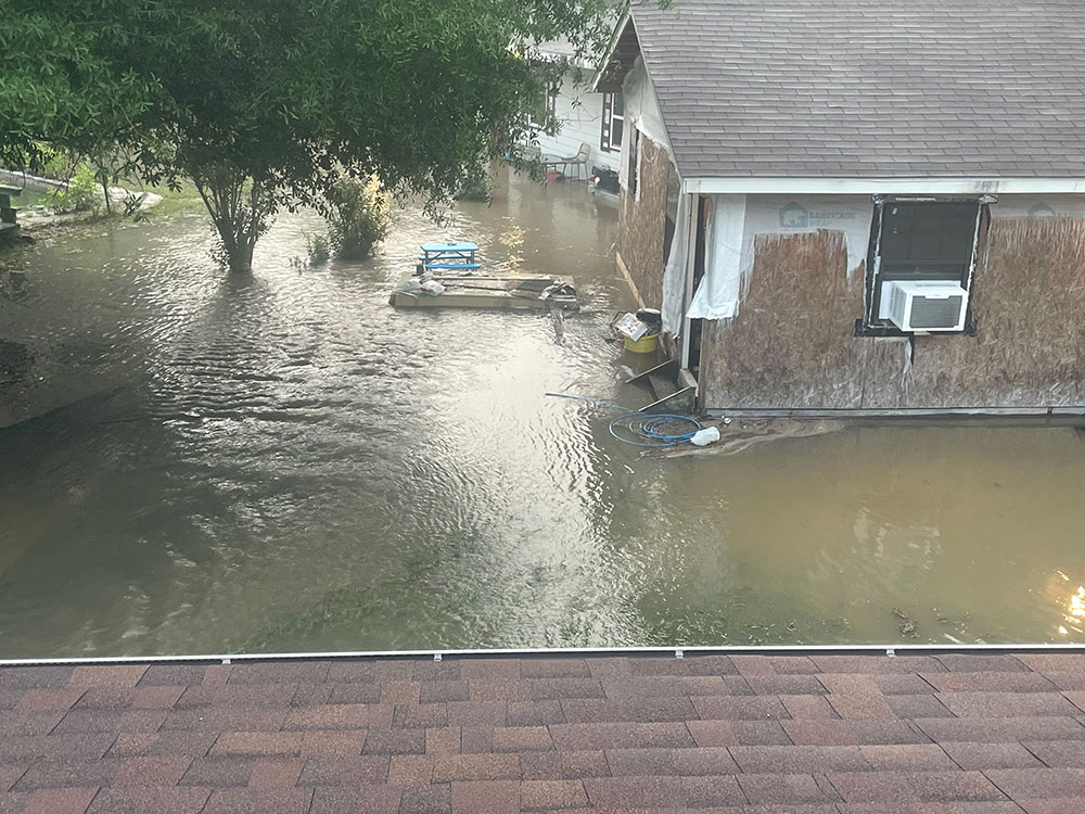 Flood waters around house