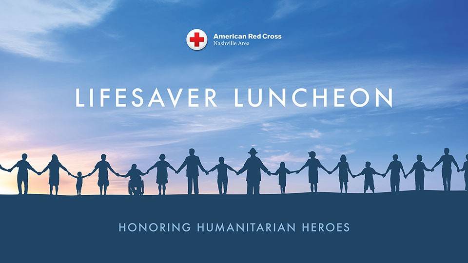 Lifesaver luncheon banner with long row of people holding hands.