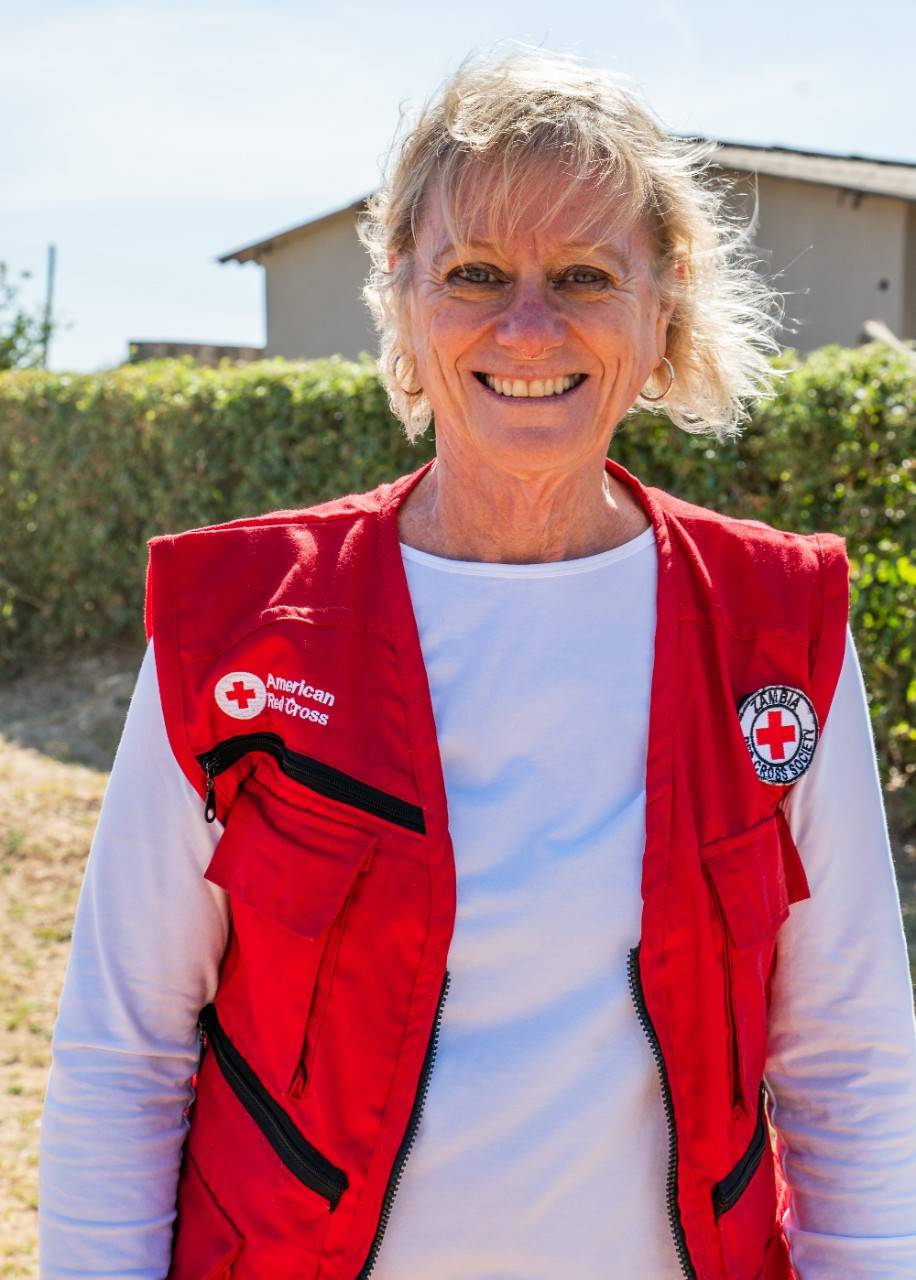 Kathy Flynn. Red vest