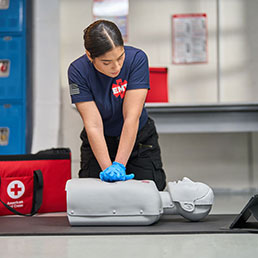 First responder practicing CPR with the Elevate™ SMART Manikin.